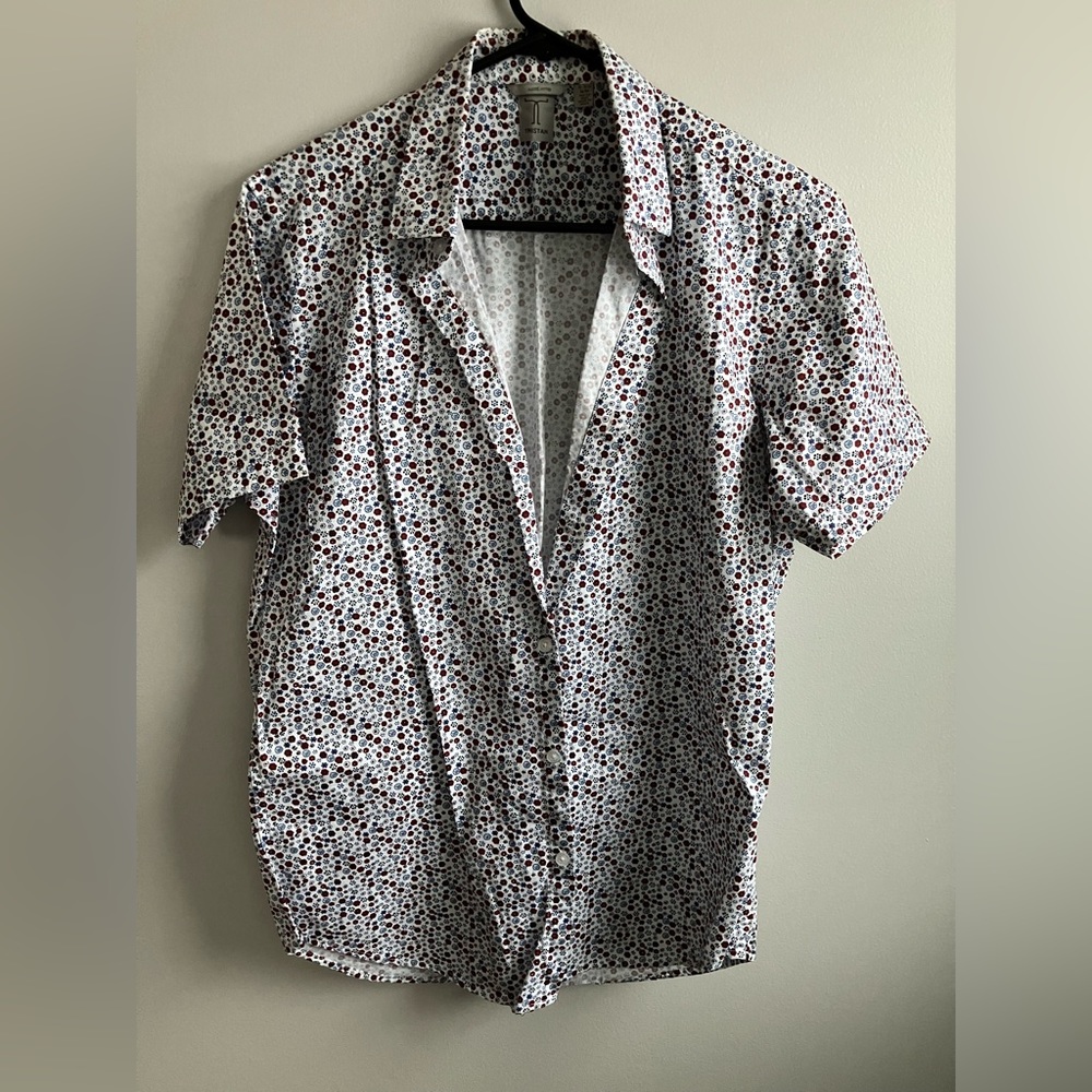 Short sleeve button down shirt with floral design